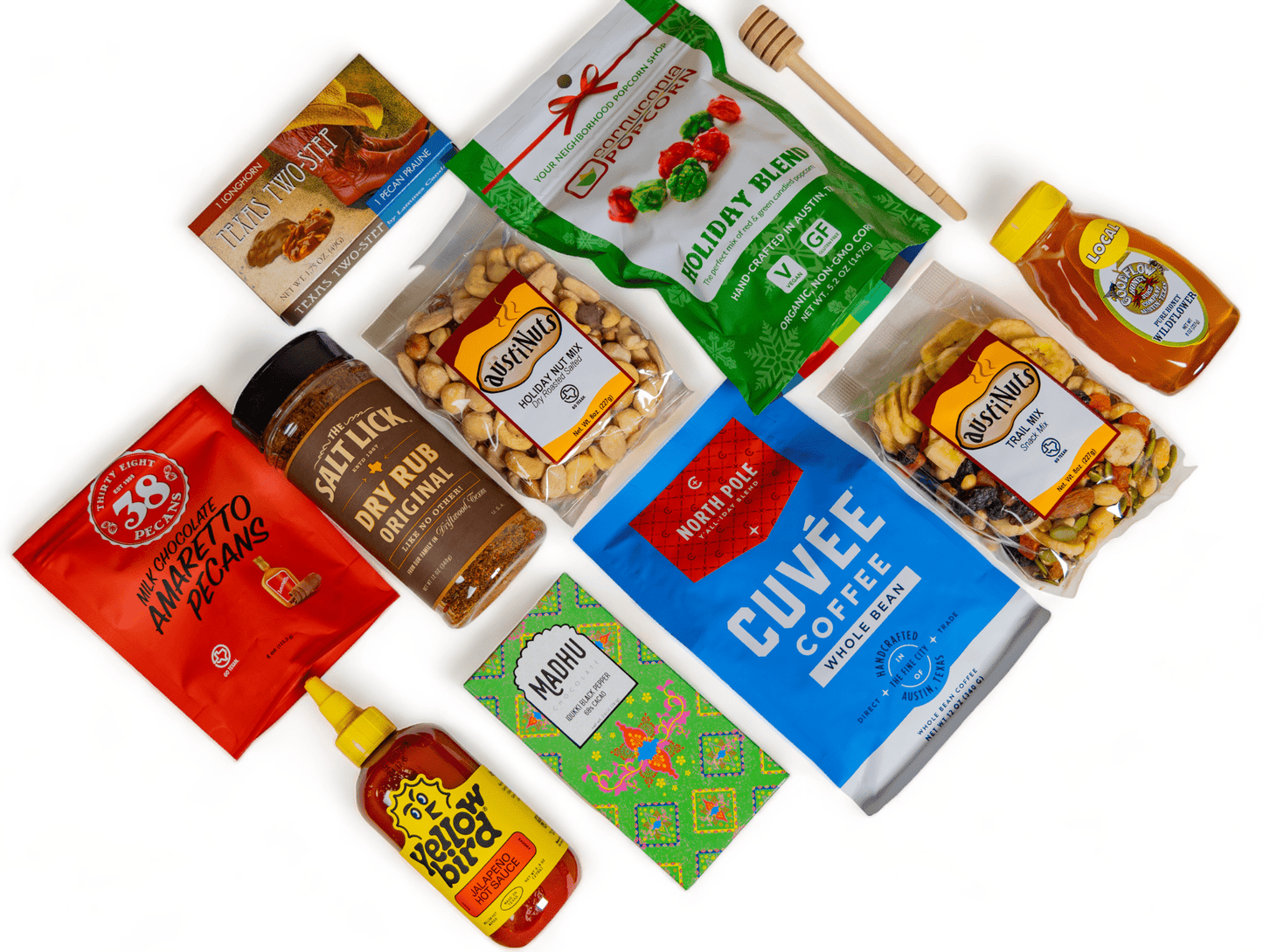 Curated holiday gift box with Texas snacks, BBQ rub, coffee, chocolate, and custom note card.