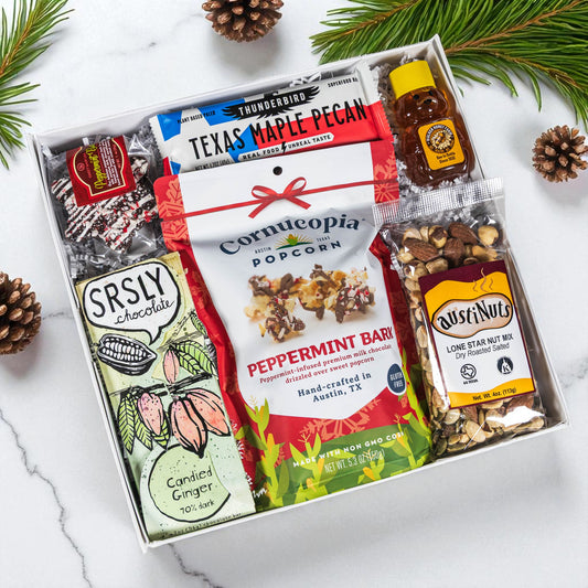 Luxury Christmas gift box with Texas-made sweets and savory treats, custom notecard included