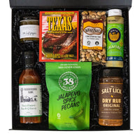 Texas BBQ Sampler Texas pecans, salsa, coffee, pancake mix, popcorn, chocolate, hot sauce, round rock jelly. The Artisan Gift Boxes 